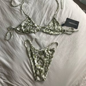 Pretty little things swimsuit. Never worn. Uk size 6